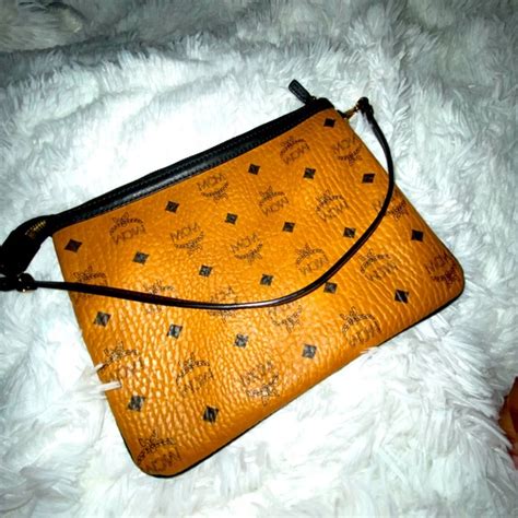 replica mcm clutch bag|mcm large pouchette.